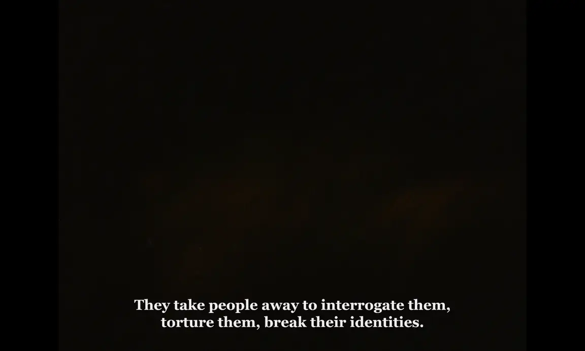 Ever Since, I Have Been Flying: near-black frame with subtitle about people taken away to be interrogated and tortured